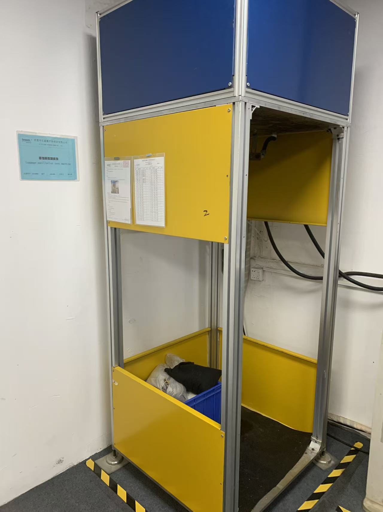 Ing Lab Sealock: Tester Dampak Osilasi Bagasi (XE-I09BA)